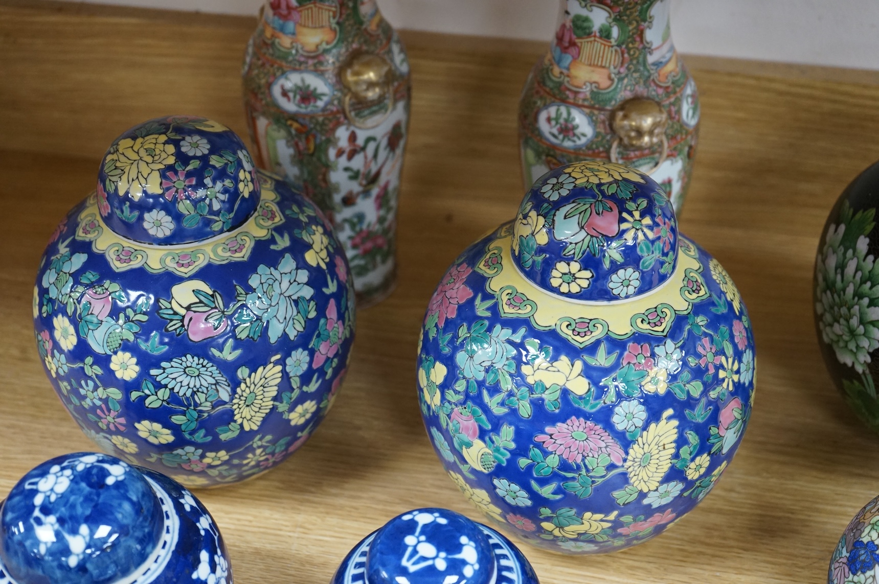 Fourteen pieces of Chinese porcelain and pottery, 19th/20th century to include a pair of blue and white ginger jars, famille rose cup and saucer and a cloisonné pot and cover in the form of an apple, largest 27cm high